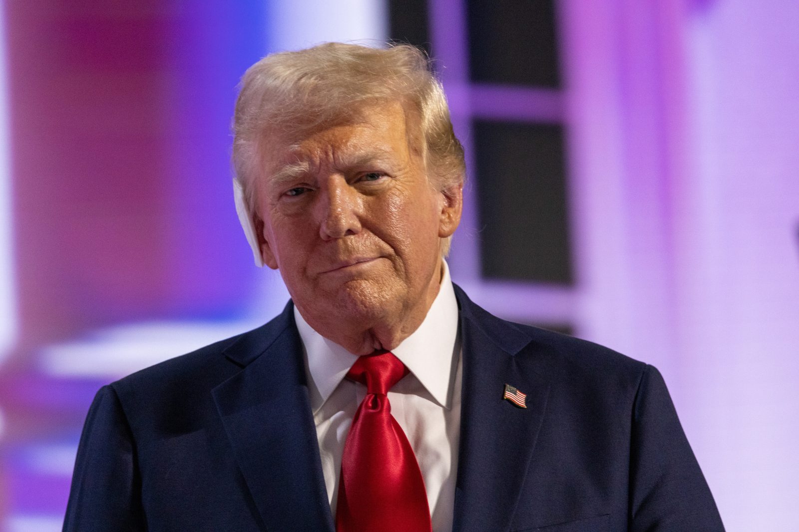 A portrait of President Donald Trump. His image is used in an article discussing a cryptocurrency token linked to him, WLFI, which recently executed a significant token burn to counter a price decline.