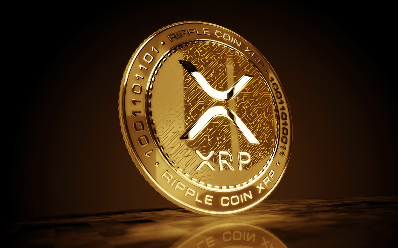 A high-quality rendering of a golden Ripple (XRP) coin, dramatically lit against a dark background. The image represents the digital asset that is the subject of a 2025 article about its significant price recovery and trader speculation.