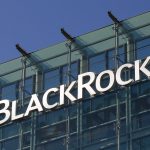 The BlackRock logo prominently displayed on the glass exterior of a modern office building.