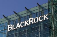 The BlackRock logo prominently displayed on the glass exterior of a modern office building.